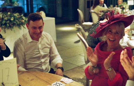 guest reacts to an magic trick with astonishment